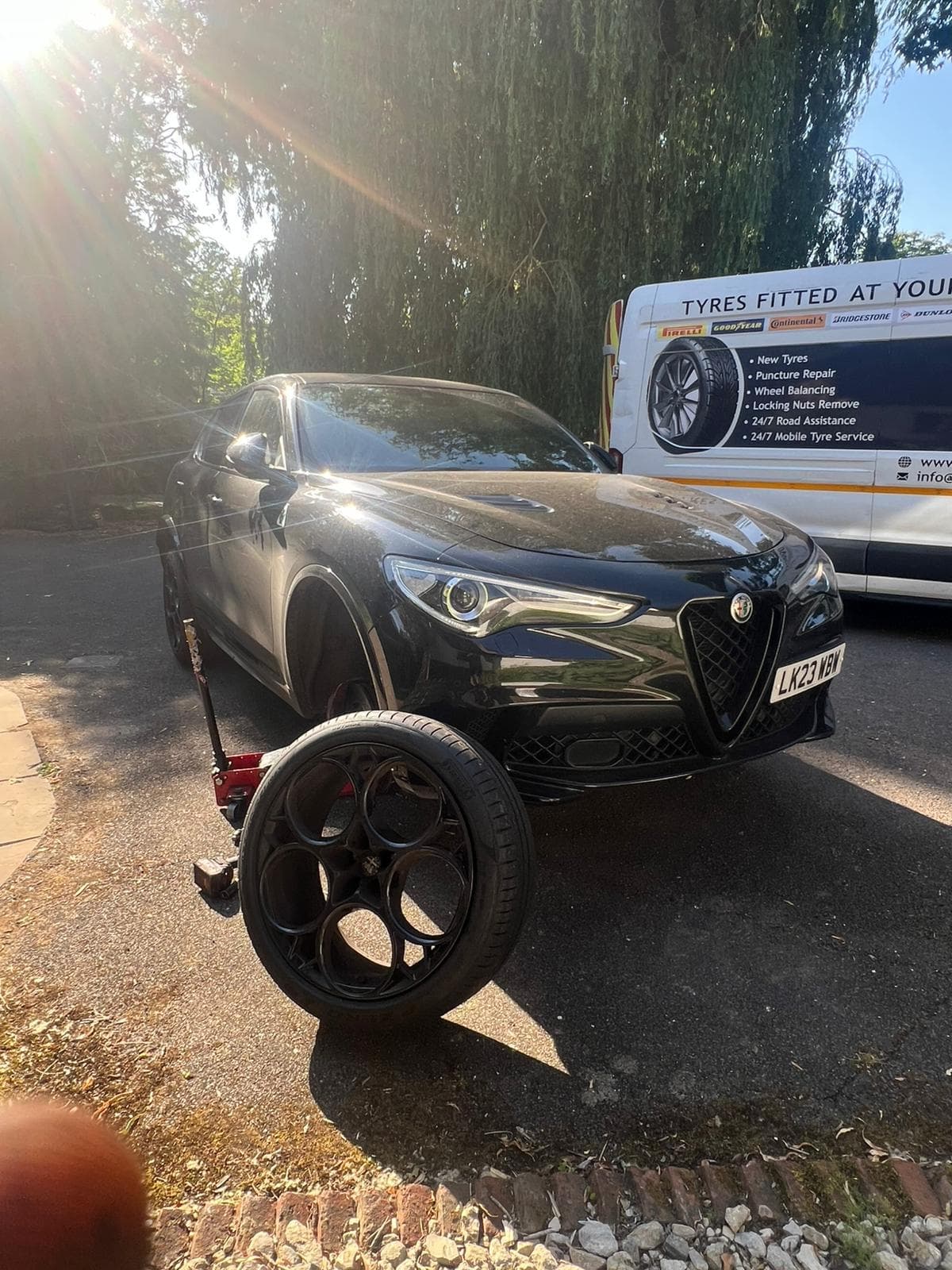 SUV tyre replacement carried out by a mobile tyre fitter at the customer's location